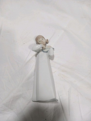 Lladro playing mandolin - playing,